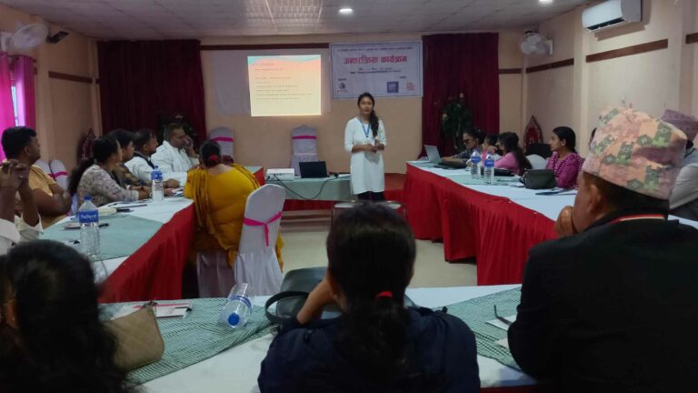 Women Development Officer giving presentation.