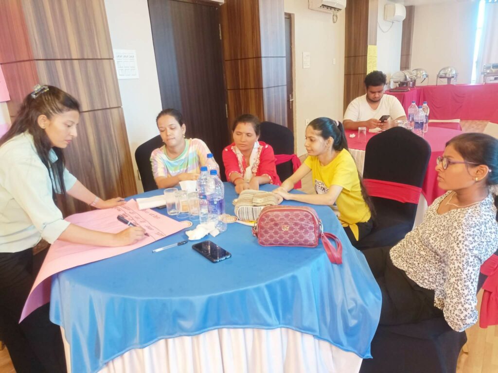 Group work by participants during the issue identification workshop.