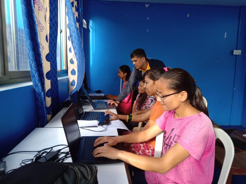 Computer classes to young women with disabilities.