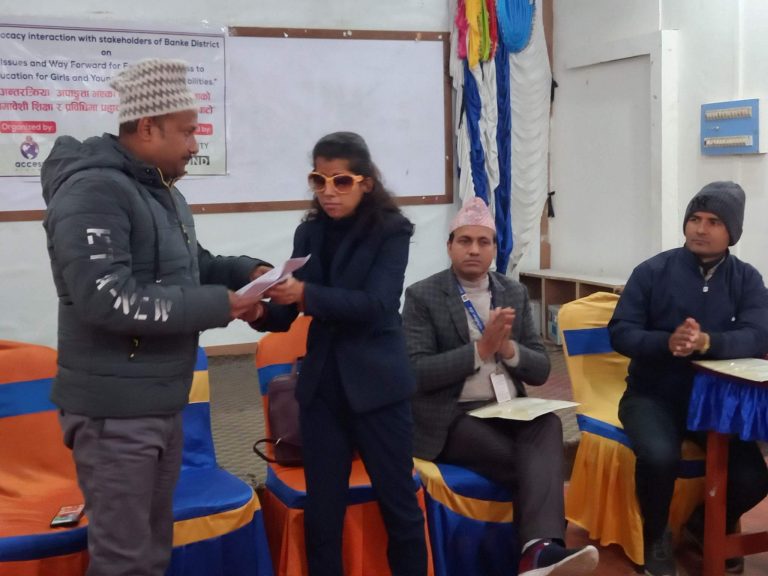 Ms. Gargi Nepal, President of Access Planet Organization handing Over Advocacy Manifesto to Mr. Prashant Bist, Mayor of Nepalgunj sub-metropolitan city.