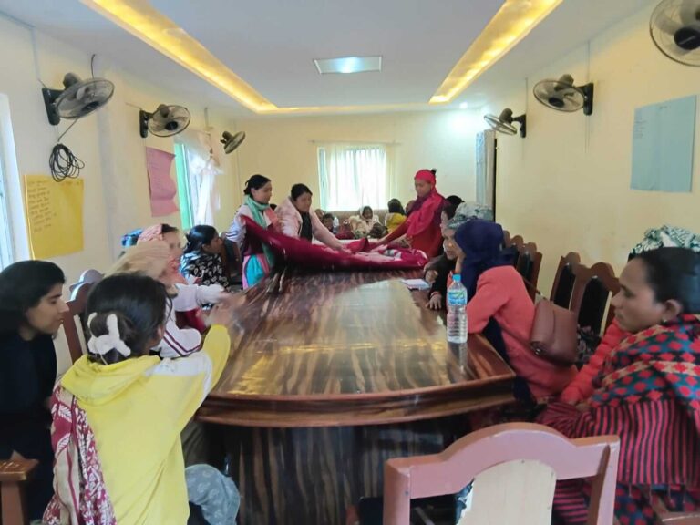 Participants learning to make stretcher